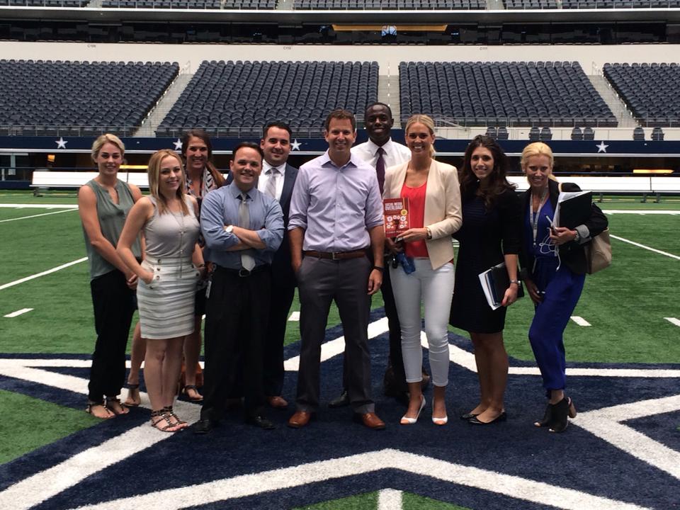 Corey consulting with the Dallas Cowboys Sales team